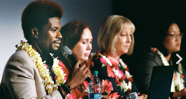 Amir Whitaker, left, civil rights attorney for the ACLU of Southern California